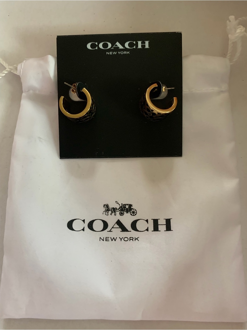 COACH Black and Gold Curved Hoop Stud Earrings